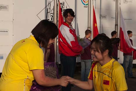 10m Air Pistol W- Olympic Champion GUO on the podium next to her teammate HU 